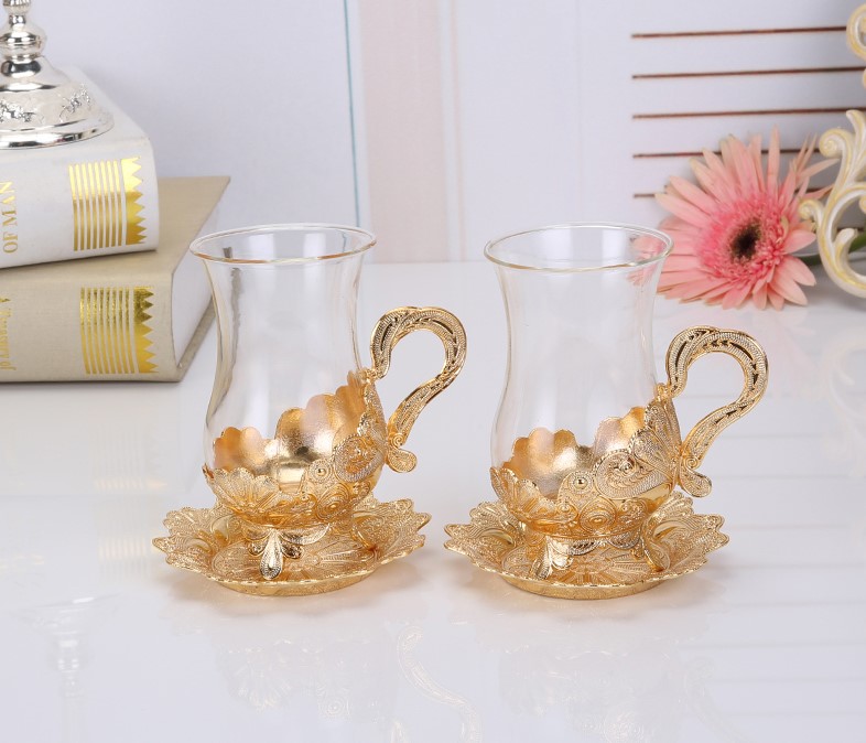 Glass Tea Cup with Gold Saucer and Carvings