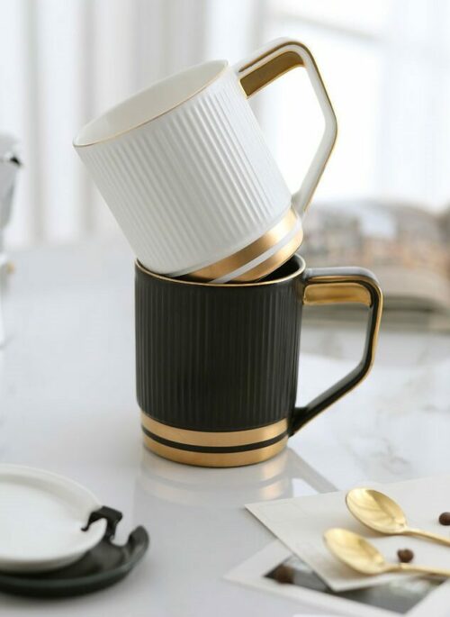 Black and Gold Cup with Lid and Gold Spoon