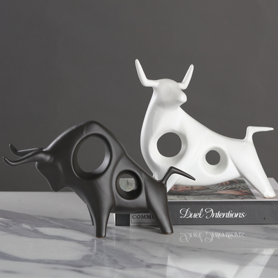 Ceramic Black and White Bull Figurines