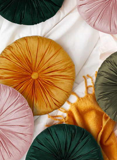 Earth Toned Round Velvet Pillows