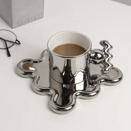 Silver Mug with Abstract-Shaped Coaster