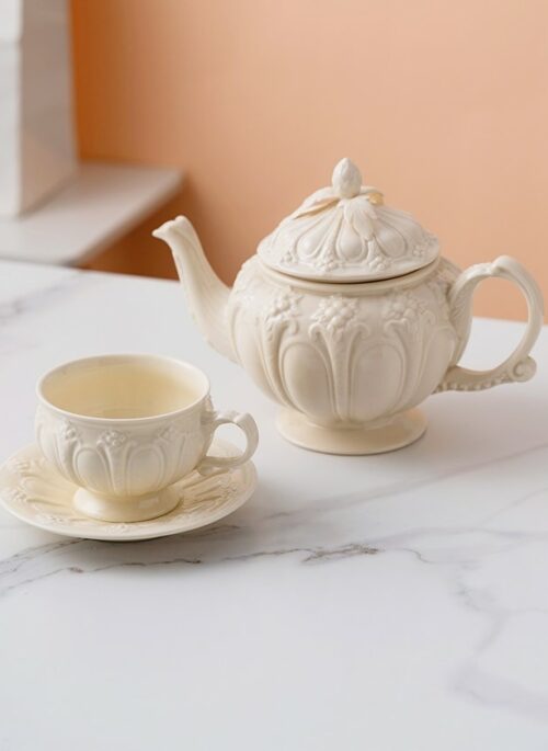 White Porcelain Tea Set with Embossed Detail