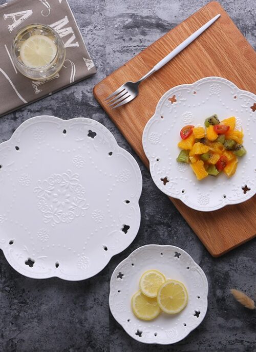 White Porcelain Plate with Embossed Floral Embellishment