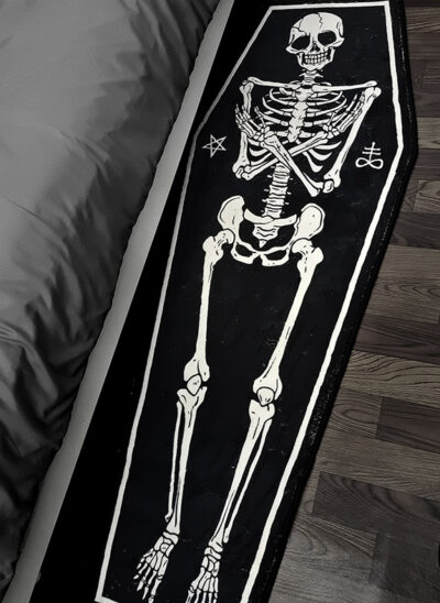 Skeleton in Coffin Area Rug
